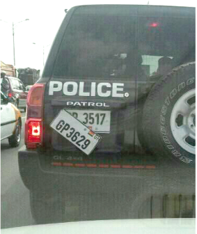 The police vehicle with two number plates used by the policemen