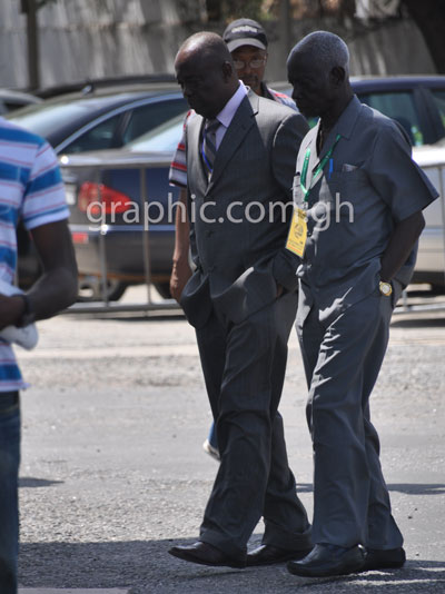 EC Chairman Afari Gyan (R) and former Deputy Chairman Sarfo Kantanka leaving the court premises after a hearing