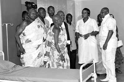 Miss Gertrude Mante (2nd right), District Director of Health Service, conducting some officials round the project. With her are Mr James Bukari Basintale, MTN General Manager for the Northern Business District, Alhaji Abdul Lateef Maujdoub (right), Adansi North District Chief Executive and Baffour Kyei II (middle), Adansi Gyasehene. Picture: John K. Essel.