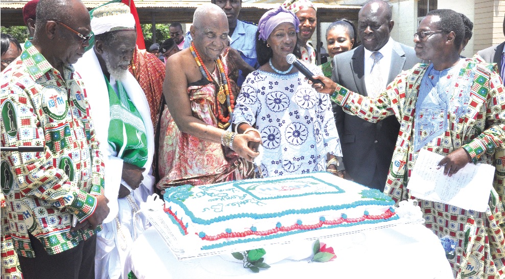 Ms Sherry Ayittey (3rd right), Shiekh Nuhu Osman Sharubutu (2nd left), National Chief Iman, and Obrempong Nii Kojo Ababio (3rd left), James Town Mantse, jointly cutting the anniversary cake. 