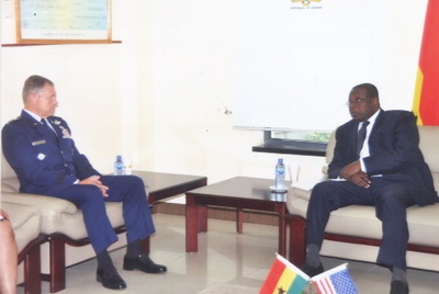 Commander, United States Air Force Transportation Command, Gen. William Franser III, interacts with Hon. Mark Owen Woyongo, Minister of Defence