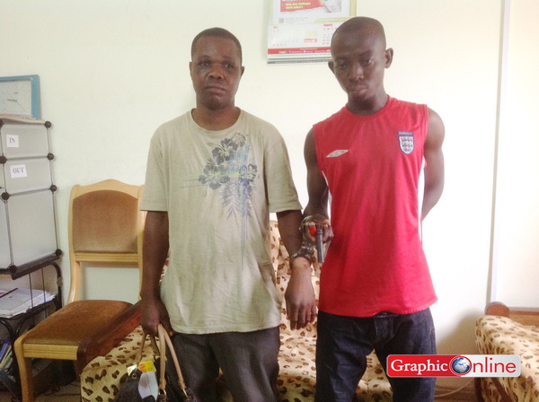 Francis Arthur, 29 (left) and Evans Mensah, 26, after they were arrested