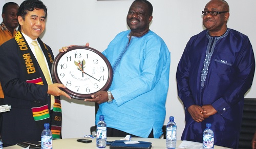  From Left - Mr. Lasro Simbolon, presenting a gift to Hon. Seth Adjei Baah, Looking on is 1st Vice President of Ghana Chamber of Commerce and Industry, Mr. Prosper Adabla.