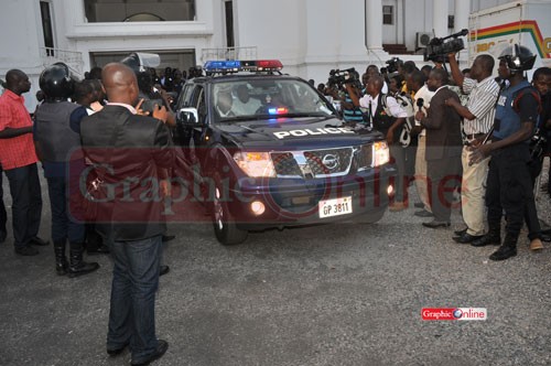 Kuranchie and Atubiga in a police vehicle on their way from court to prison