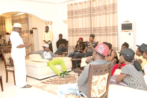 â€¢ Ivan Quashigah of Farmhouse (standing) welcomed the contestants to the Hit-Maker house.