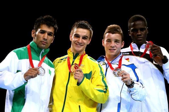 Flashback: Abdul Wahid Omar (right) and other medalists displaying their medals at the 2014 Glasgow Commonwealth Games