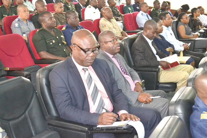  Maj. Derrick Oduro (retd) [inset] addressing participants in the opening session of the course in Accra