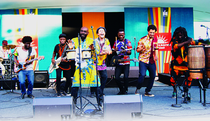 Pat Thomas (behind bongos) and the Kwashebu Area Band on stage.