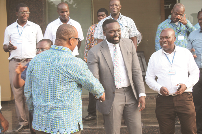  Mr Darlington Ahuble (left), President, Society of Volta River Authority Engineers (SOVRAE), exchanging pleasantries with Mr Oheneba Ofori Boateng (2nd right), after the ceremony. With them is Mr Francis Yao Agbenyo (right), Past President of SOVRAE. Picture: EDNA ADU-SERWAA