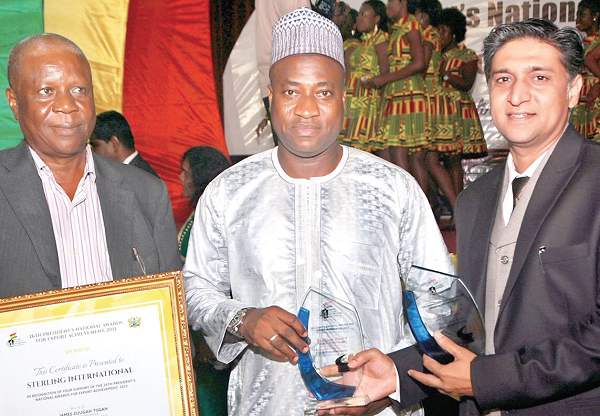 The platinum awards were presented to Mr Arun Patil, Executive Director (right) and Mr Chris-Arcmann Ackummey (left) of Sterling International Limited by Mr Murtala Mohammed (middle), Deputy Minister of Ministry of Trade and Industry