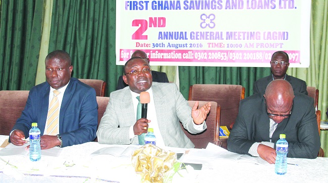  Mr John Kweku Asamoah (middle), Board Chairman of First Ghana Savings and Loans Limited, responding to a question. With him are Mr Theophilus Dorgbetor (left), Board Member and Mr Patrick Tei Kwapong (right), Ag Managing Director of First Ghana Savings and Loans Limited. PICTURE: MAXWELL OCLOO