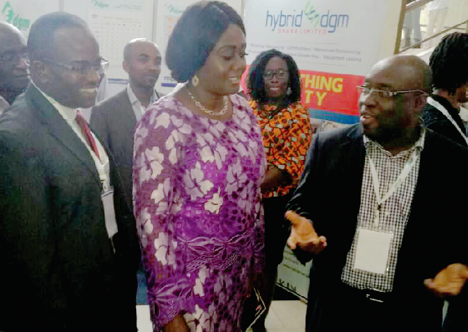 Mrs Barbara Oteng-Gyasi (2nd right) Deputy Minister for Lands and Natural Resources,  interacting with some executives of the Chamber of Mines