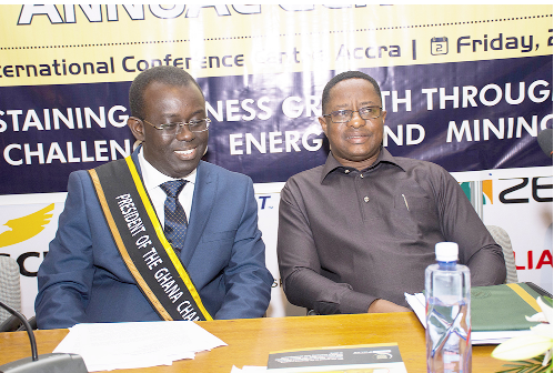 Mr Addo Kuffuor (right) with the Minister of Lands and Natural Resources, Mr John Peter Amewu, at the AGM