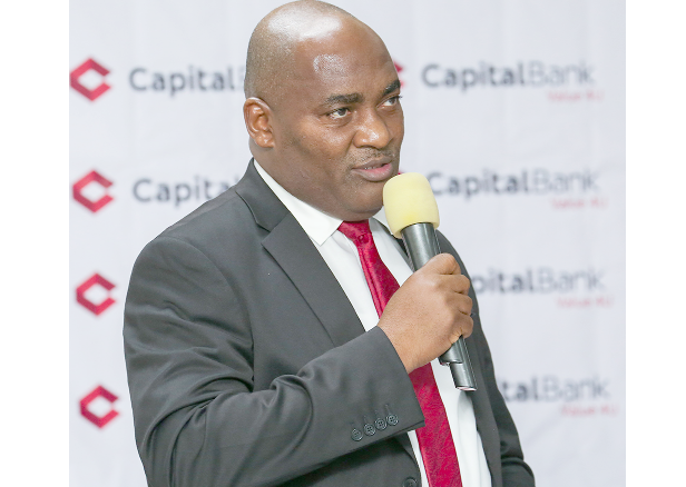 Rev. Fitzgerald Odonkor, MD of Capital Bank, addressing participants