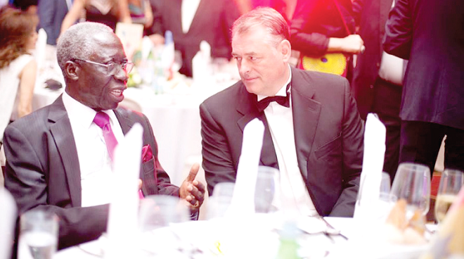 Mr Yaw Osafo Maafo (left), Senior Minister, in a chat with Mr Pujolas, French Ambassador to Ghana at the gala night