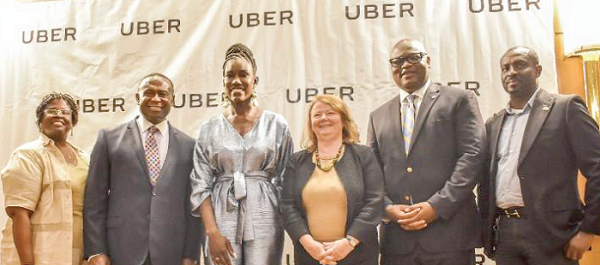 Ms Saint John (3rd left) with Mr Simon Madjie (2nd right), Executive Secretary of AMCHAM Ghana and Mr Joe Mensah (2nd left), President of the chamber and others