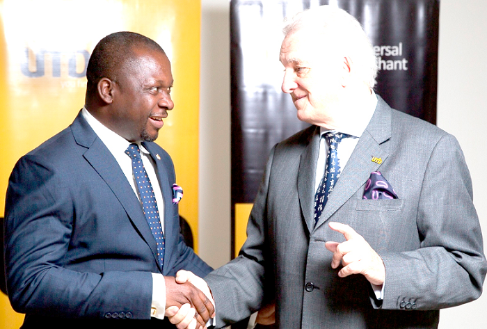  Mr John Awuah (left), CEO of UMB Bank, welcoming Mr Kevin Cain, UMB  Bank's new Director of Consumer and Business  Banking