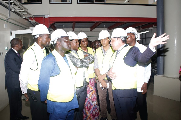 Dr Said Deraz (hand raised), Chief Executive Officer of the Gold Coast Refinery, explaining a point to Mr John Peter Amewu (3rd left), Minister of Lands and Natural Resources, and other officials, during a tour of the refinery in Accra. Picture: GABRIEL AHIABOR