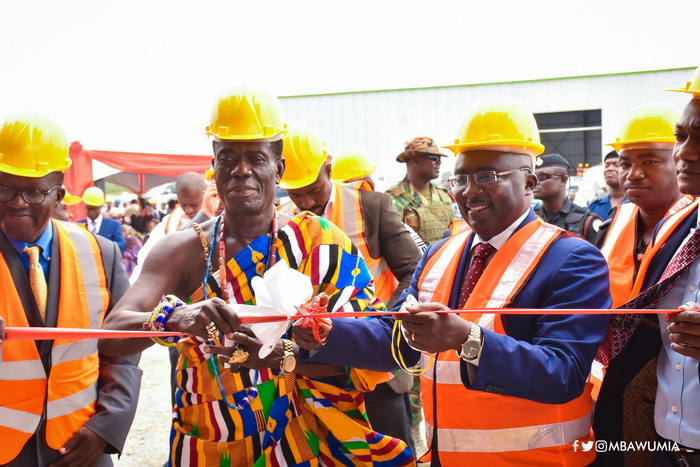 Vice-President Bawumia being assisted to cut the sod to commission the sleeper plant