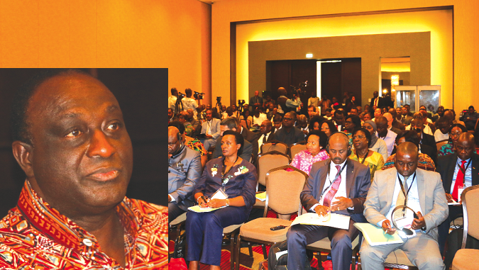 Mr Alan Kyerematen (left) addressing participants in the conference 