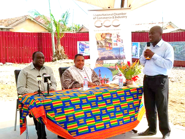 Mr Alan Kyerematen (seated left), with Nana Appiagyei Dankawoso I, at the commisioining of the office complex