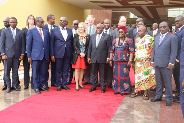 President Akufo-Addo with members of ExxonMobil after a meeting at the Flagstaff House in Accra.