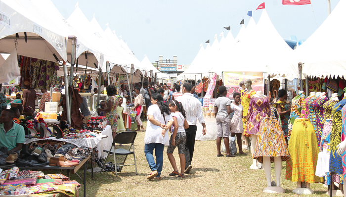  Some patrons of the fair looking at  the items on display. Picture: BENEDICT OBUOBI