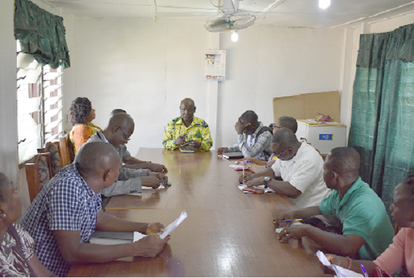 Mr George Boateng, Accountant, Presbyterian SHS, Bechem interacting with some members of the PIAC/IFEJ team 