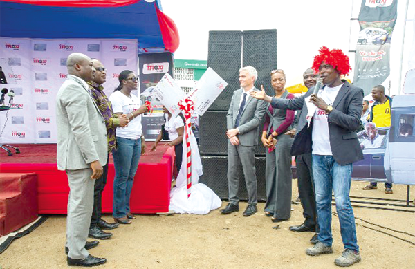  Mr Franchini (4th right), MD of Total Ghana, joined by other management members of Total to unveil the card