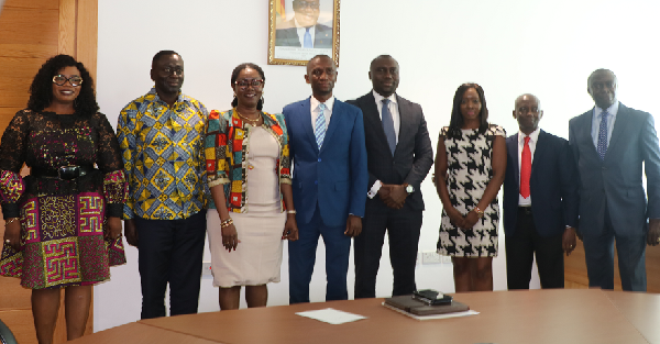 The Minister for Communications (3rd left) in a photo with the board members after the inauguration 