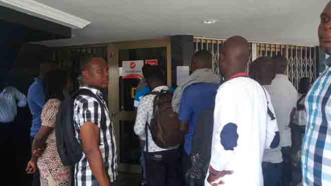 Some customers of uniBank at the Kokomlemle branch in Accra. PICTURE BY EBOW HANSON