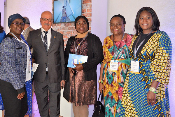 The Director General of OFID (2nd left) Mr Al-Herbish in a group photo with Ghana's Minister of Local Government, Hajia Alima Mahama and some beneficiaries of the OFID Sponsorship package