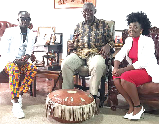Okyeame Kwame and his wife Annica with former President J.A. Kufour