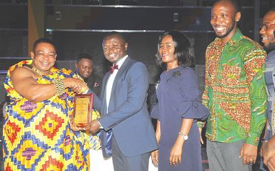 Nana Appiagyei Dankawoso presenting the top Insurance Brokers award to Mr Foster Mireku, area manager of KEK Insurance brokers Limited. Picture: EBOW HANSON  