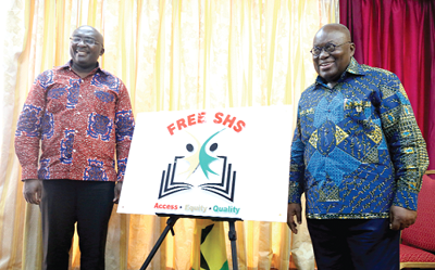  President Akufo-Addo and Vice President Mahamudu Bawumia in a pose for the cameras with the Free SHS Logo at the Flagstaff House. Picture: SAMUEL TEI ADANO