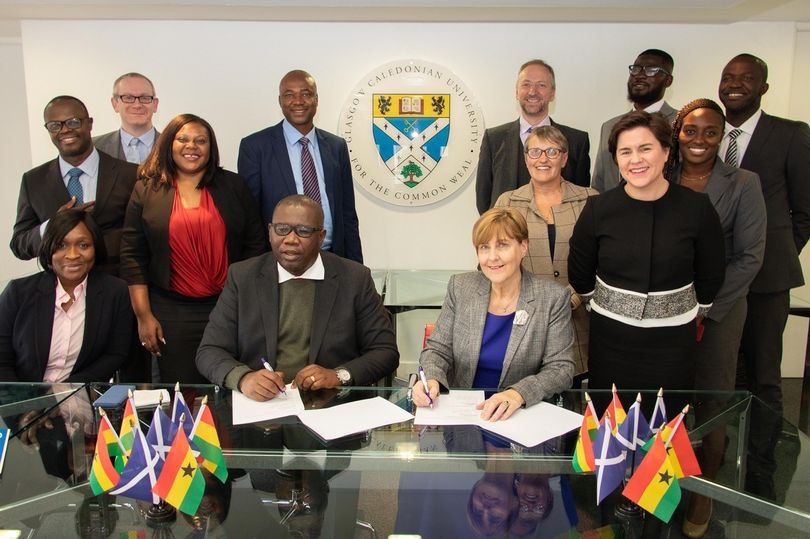 Members of the Petroleum Commission Ghana and Glasgow Caledonian University sign the partnership agreement