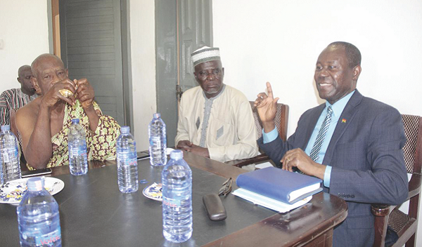 Mr Joseph Aidoo (right), with Alhaji Alhassan Bukari (middle), National President, (COCOSHE) and Nana Peter E. Damoah, Brong Ahafo Regional Chief Farmer. 