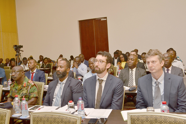 • Mr Albert Kan-Dapaah (INSET), Minister of National Security, addressing the participants in the meeting