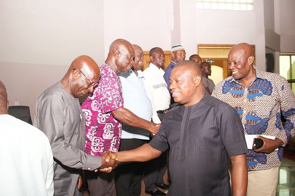 Mr John Allotey (2nd right), Deputy Executive Director, Forestry Commission, congratulating members of the Charcoal Chamber of Commerce. Picture: NII MARTEY M. BOTCHWAY