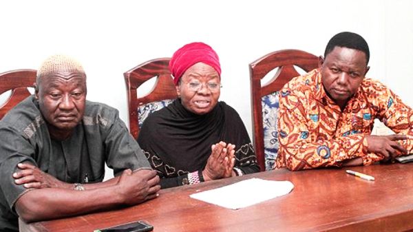 Mrs Victoria Adongo (middle), Executive Director of Peasant Farmers Association of Ghana addressing the media at the event. Those with him are Mr Abdul Rahman Mohammed (left), National President of the Peasant Farmers Association of Ghana and Edward Karewa, General Secretary of the General Agriculture Workers Union (GAWU). Picture: GABRIEL AHIABOR