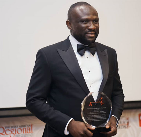 Mr. Abdul-Wahab displaying his award. 