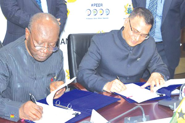 Mr Ken Ofori-Atta (left), Ghana's Finance Minister, and Mr Pushpesh Tyagi of India EXIM Bank, signed the agreement