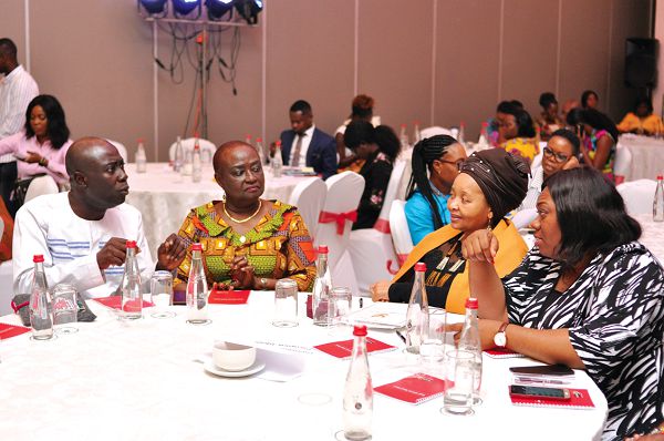 Mr Kwesi Eyison (left), explaining some points to Ms Lulu Xingwana (2nd right),  Mrs Stella Appenteng (2nd left), Member, TOUGHA, and Madam Eunice Ogbugo (right), President, Women in Business & Tourism Ghana, during the Tourism Road Show in Accra. Picture: NII MARTEY M. BOTCHWAY