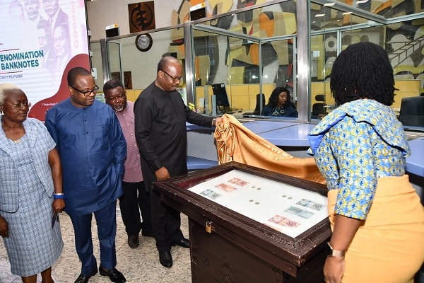 Dr Ernest Addison, Governor of Bank of Ghana unveiling specimen of the new denomination. 