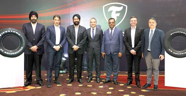 Mr Stefano Sanchini (2nd left), Mr Arshdeep Chadha (3rd left) and other officials from both Bridgestone and Infinity after the launch of the Firestone tyre brands.