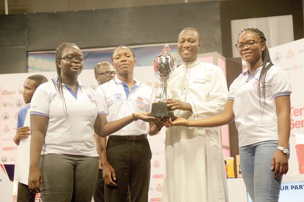 Mr Alhassan Yussif (2nd right), Quiz Master with the winners after the contest.