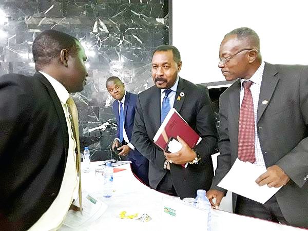 Nana Osei Bonsu (2nd right) interacting with Mr Stephen Antwi (right) and other dignitaries.