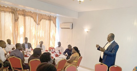   Mr Fred Atogiyire (standing) addressing journalists at the event.