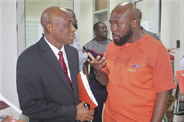 Mr Senyo Hosi (right)  Mr Seth Terkper (left), a former Minister of Finance at the launch of the report.