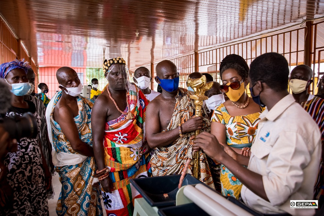 Dr Afua Asabea Asare (2nd right), the CEO of GEPA, interacting with a bauxite bead producer. Looking on are Nana Barima Kwadwo Addo (2nd left), Abompehene and others